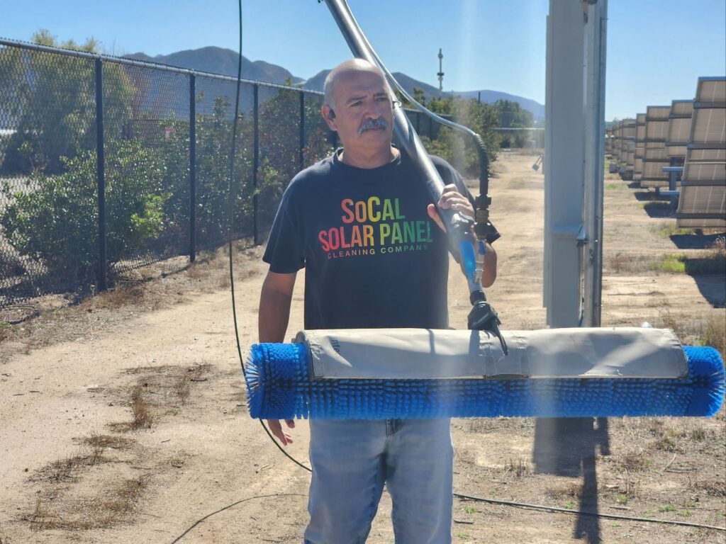 Henry Sanchez at the site of a commercial solar panel cleaning job